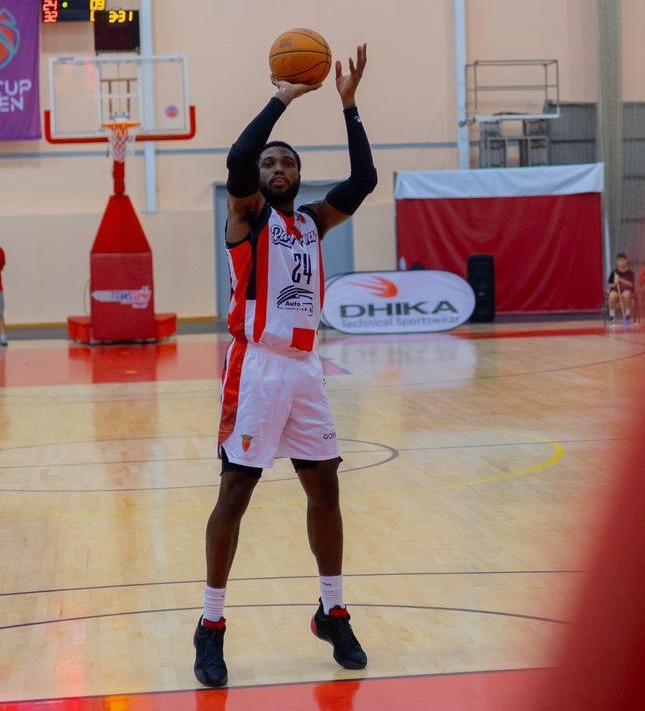 Opong Bramble rising for a shot in a professional game